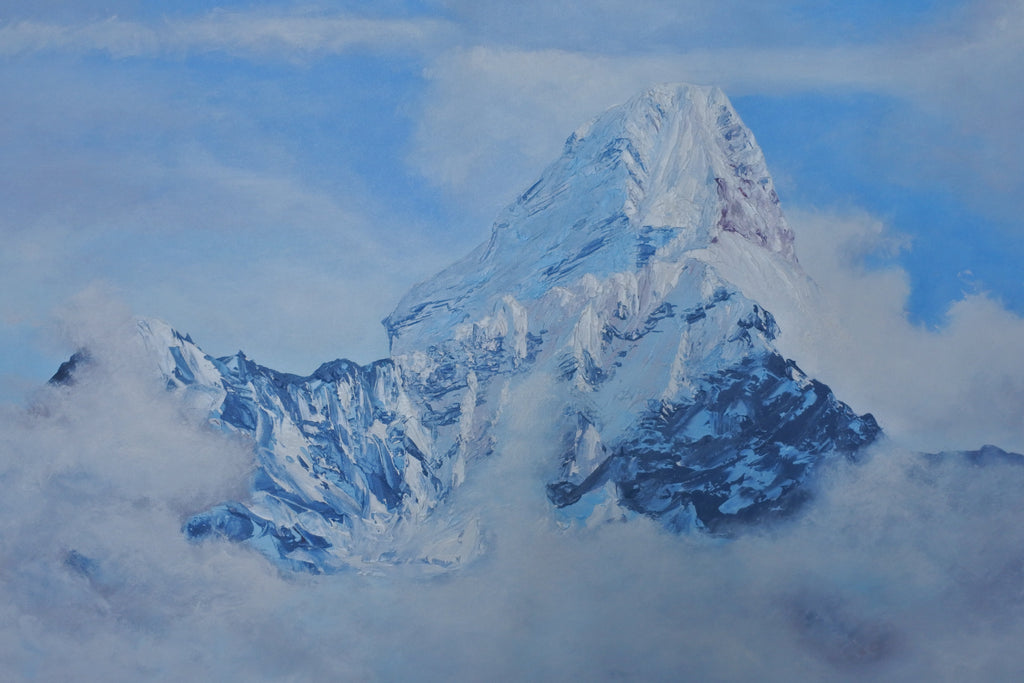 A painted mountain landscape showing a snow-covered peak rising above clouds, with blue sky and icy blue-gray shadows.