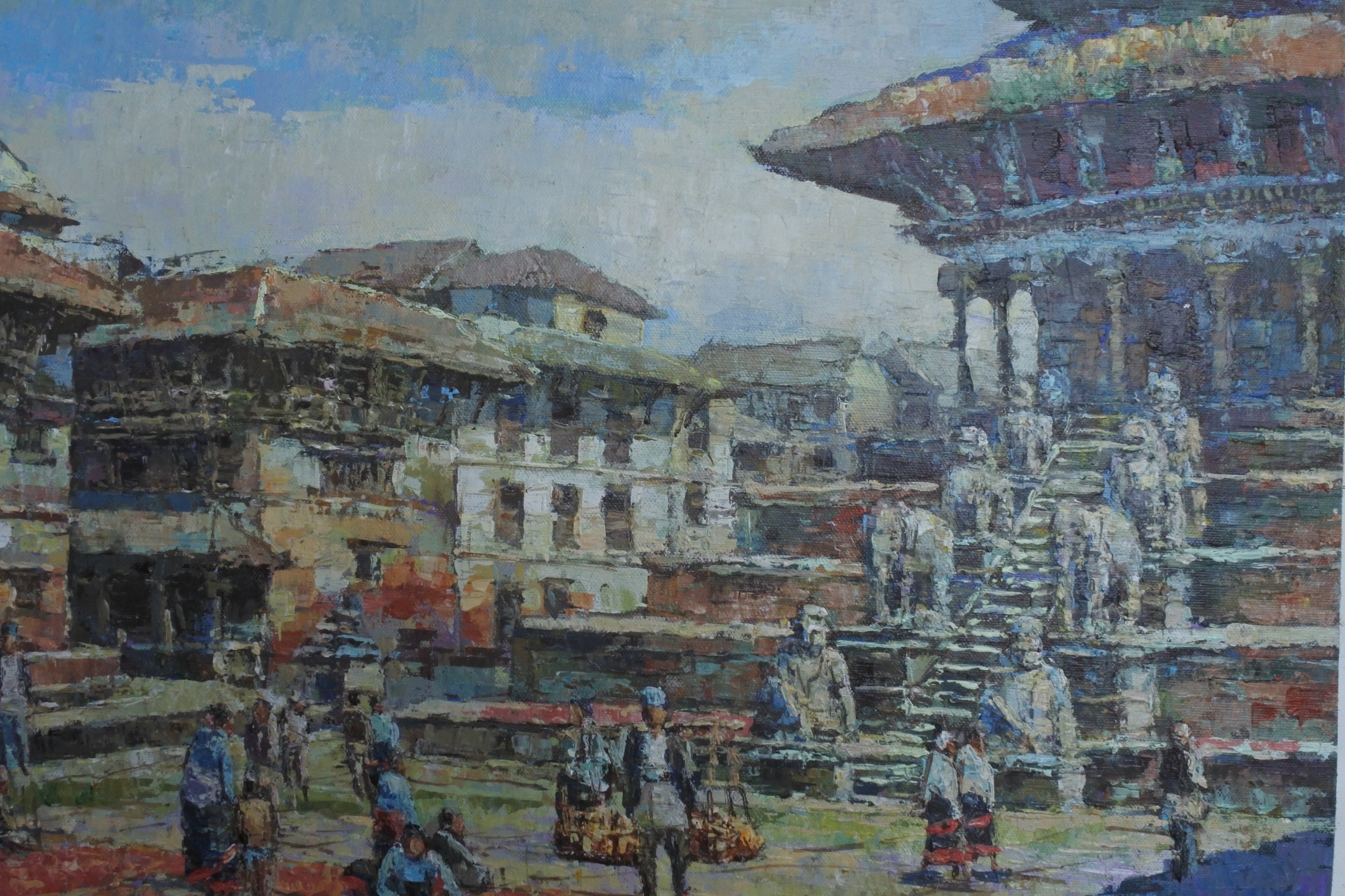 Painting of a bustling street scene with traditional architecture and people.