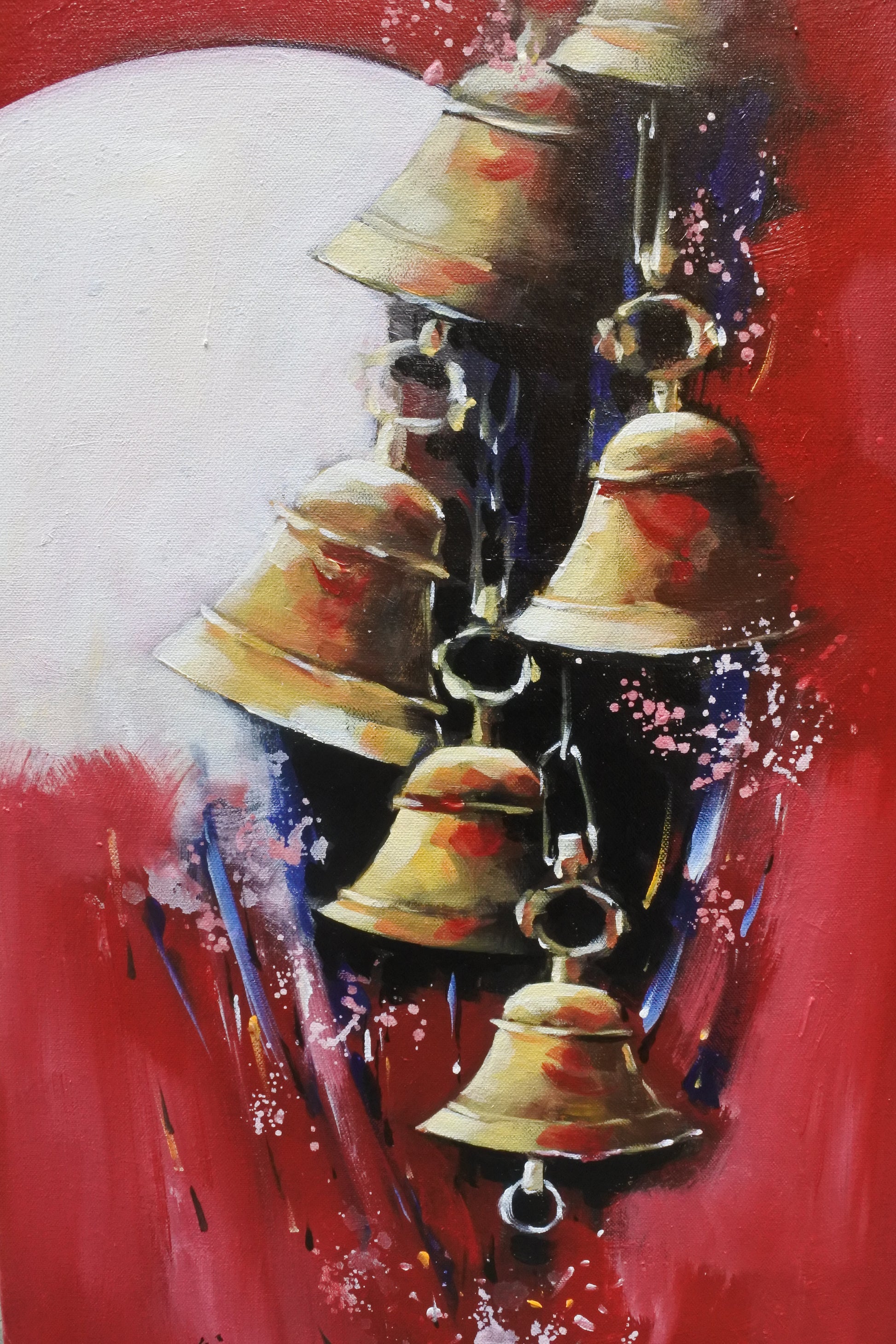 Abstract painting with gold and red elements on a red background